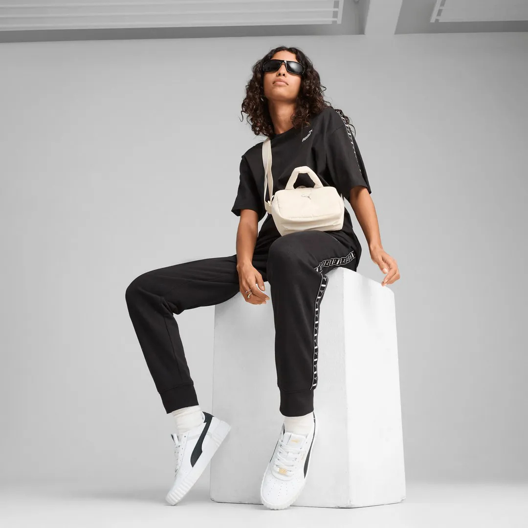PUMA ESS TAPE Sweatpants en Noir | Confort et style
